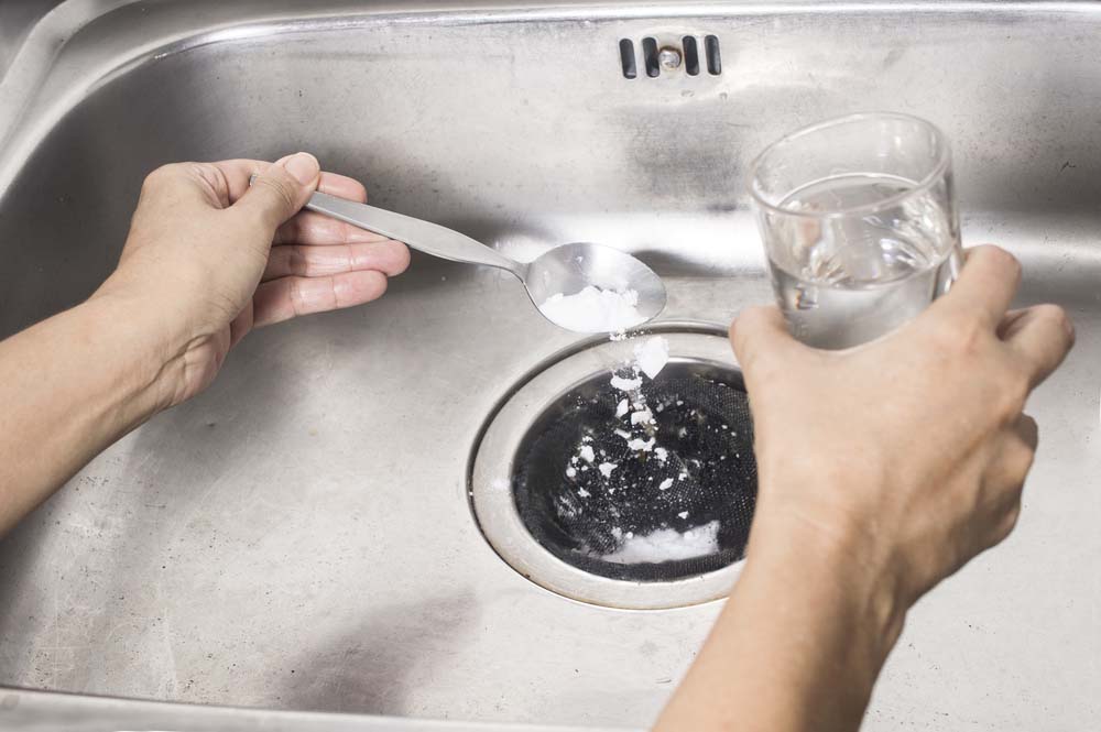 deodorizing kitchen sink drains with baking soda
